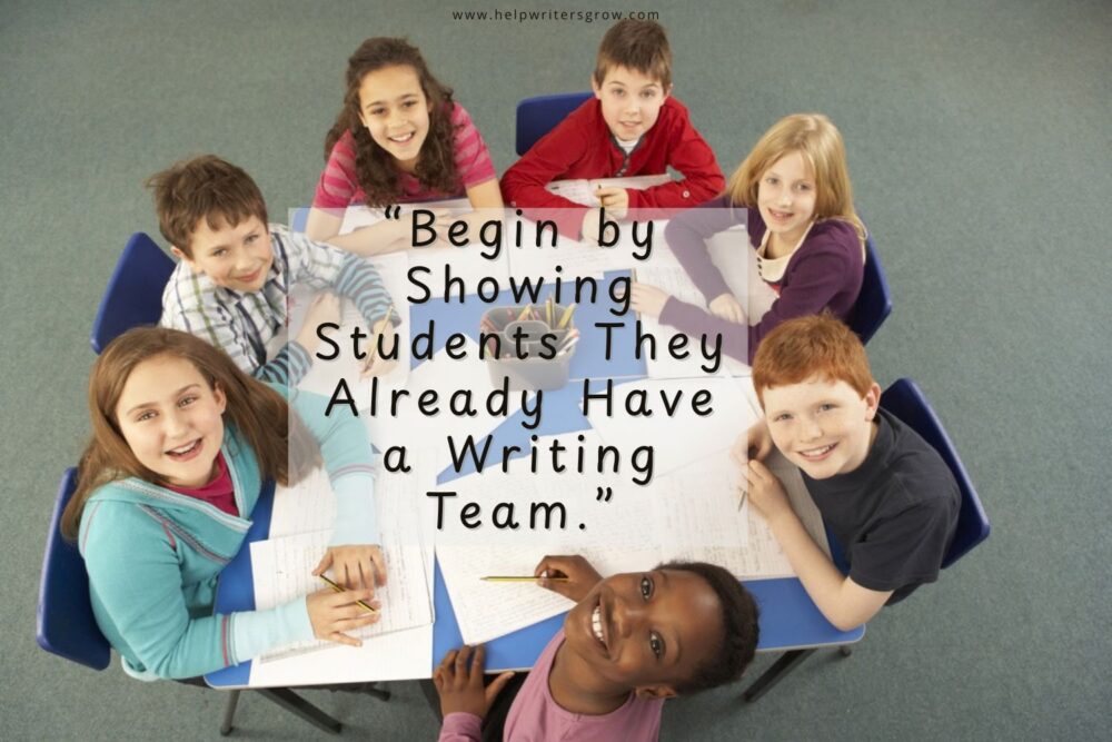 Elementary students gathered around a table with writing notebooks, collaborating and sharing ideas.